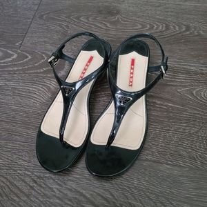 Prada Logo Patent Low Wedge Thong Sandals